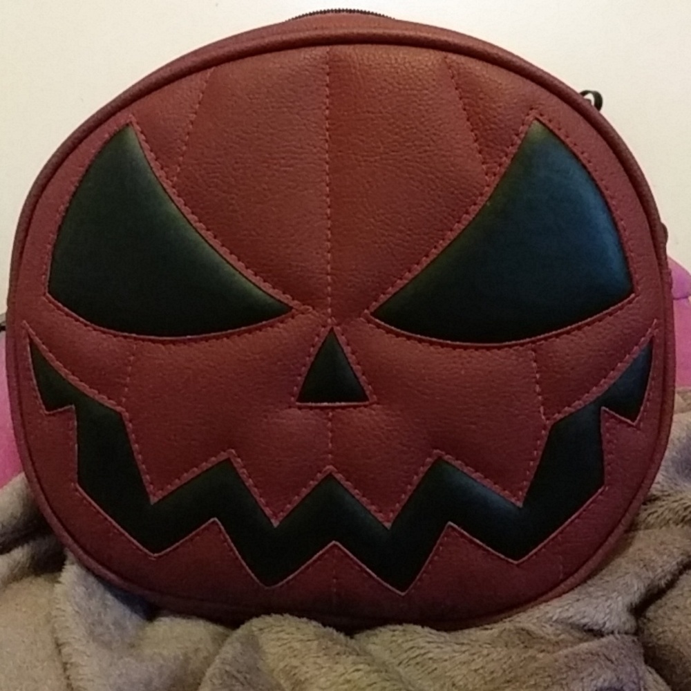 Love pain and stitches pumpkin purse